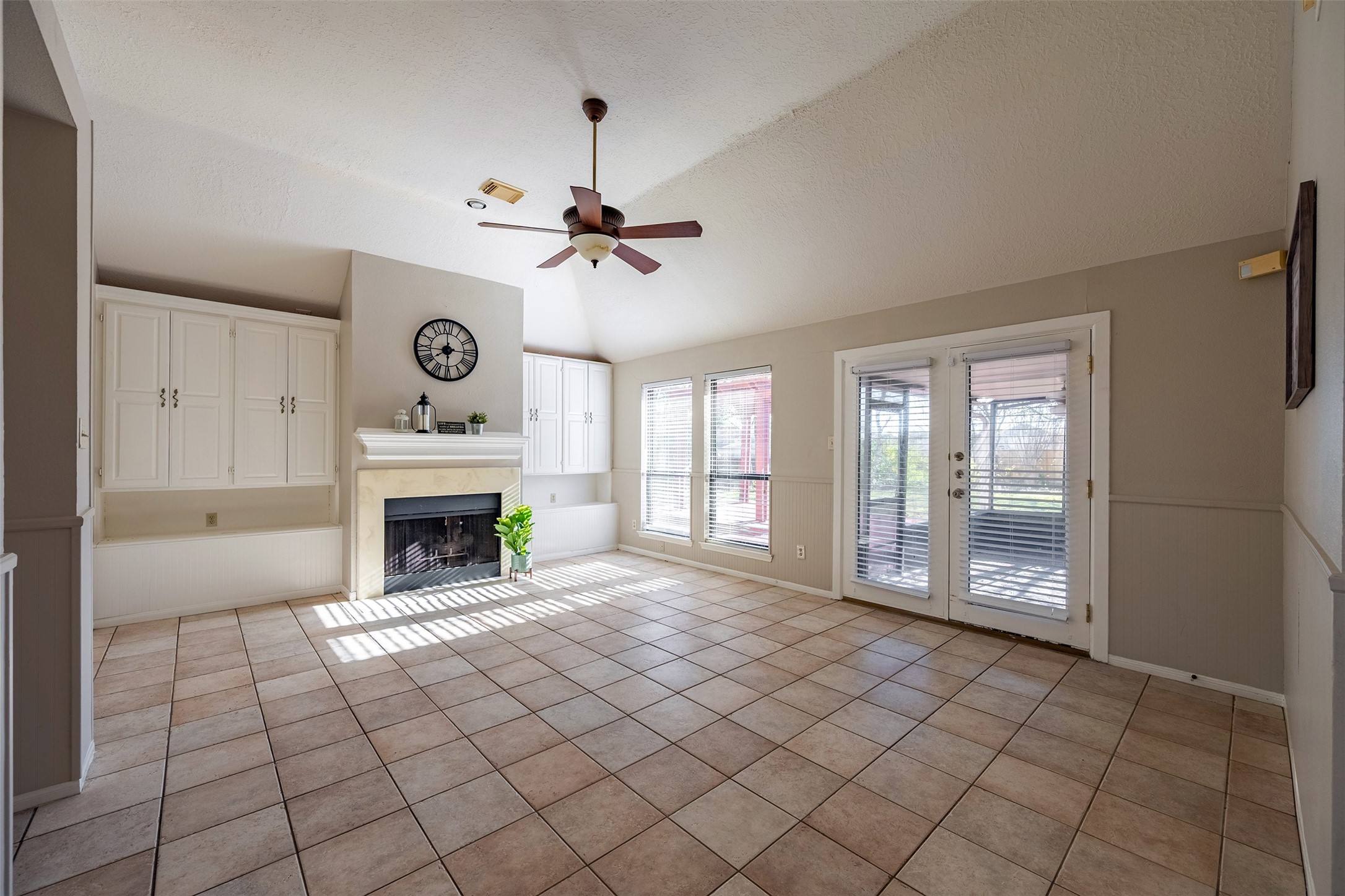 13623 Bonilla Lane Houston, TX 77083 - Photo 15 of 34 a view of an empty room with window and fireplace
