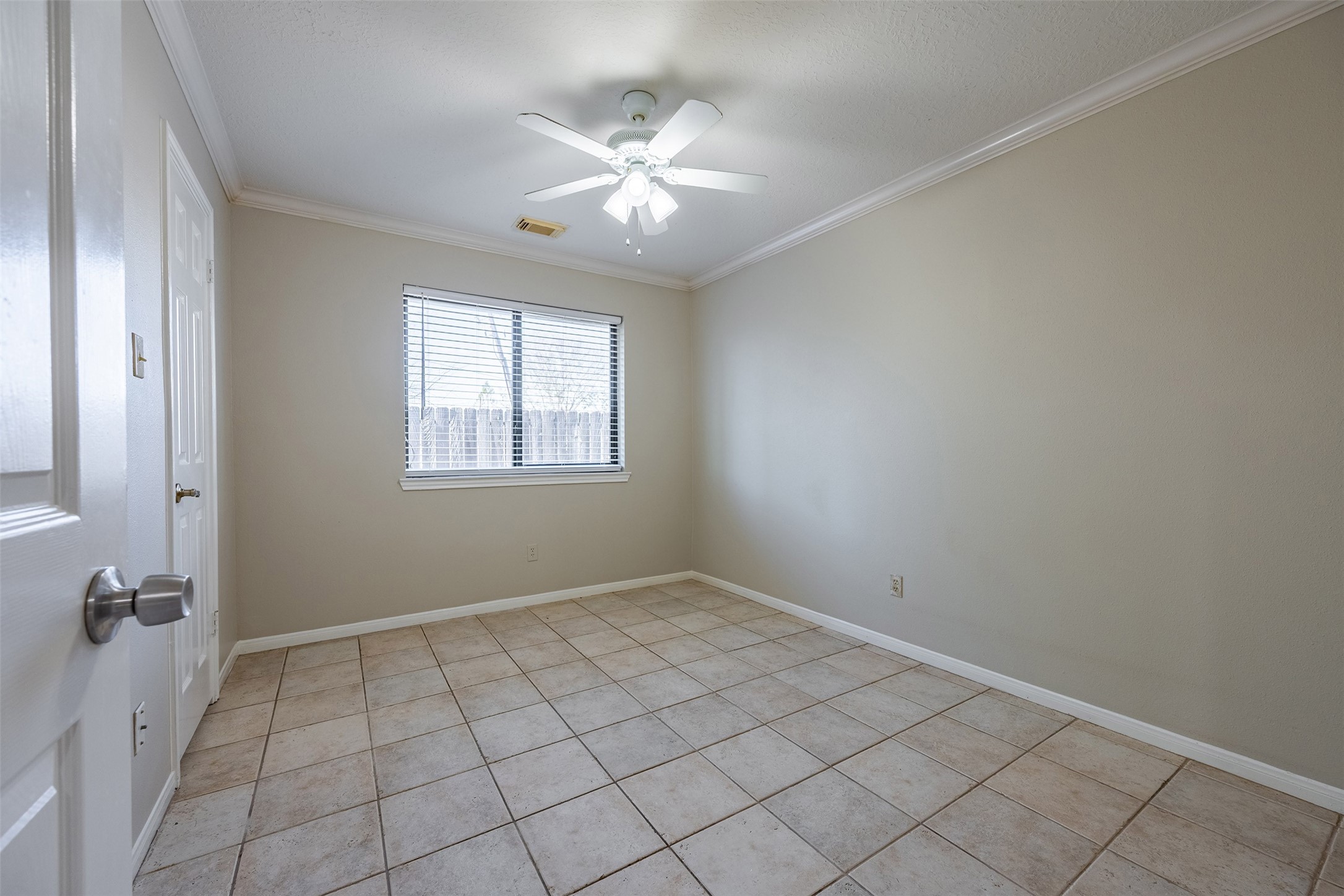13623 Bonilla Lane Houston, TX 77083 - Photo 17 of 34 wooden floor in an empty room with a window