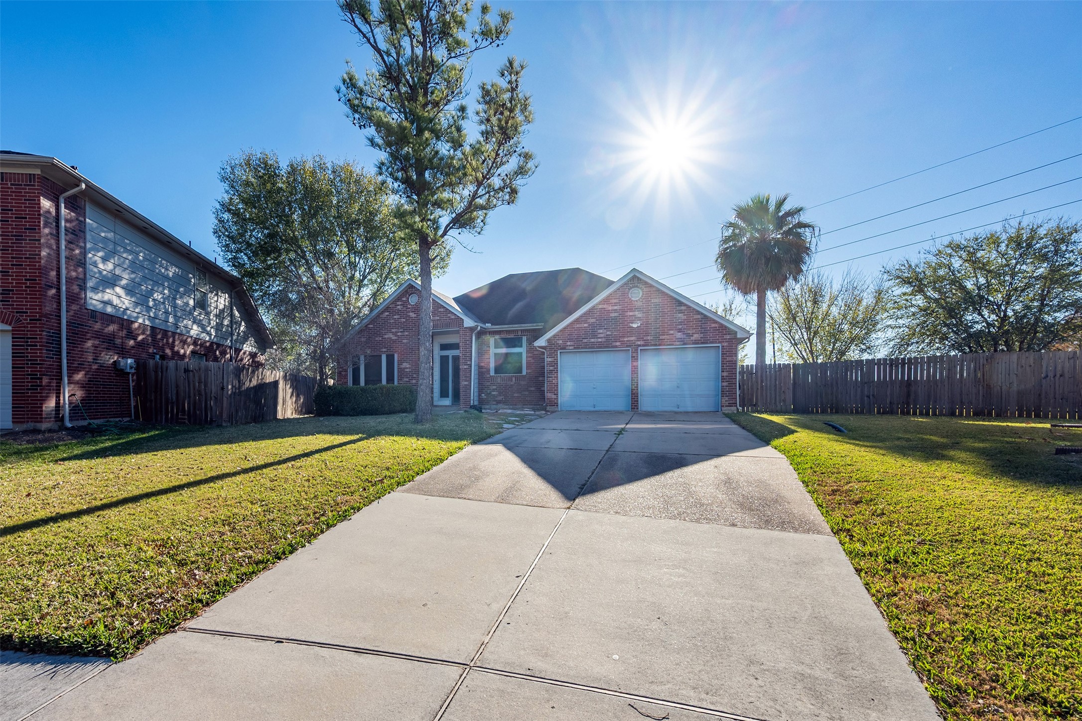 13623 Bonilla Lane Houston, TX 77083 - Photo 3 of 34 a house view with swimming pool in front of it