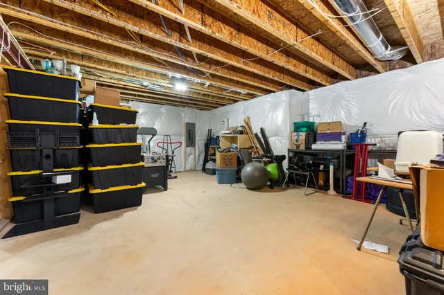 a view of a storage area with shoes and chairs