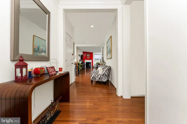 a living room filled with furniture and a furniture