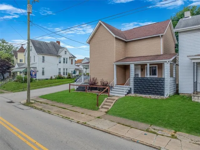 a house view with a garden space