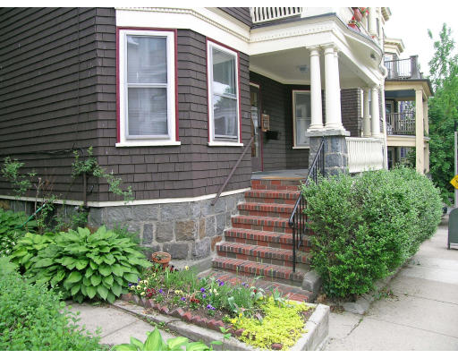 28 Parkton Road, Unit 2 Boston, MA 02130 - Photo 2 of 14 a front view of a house with a yard