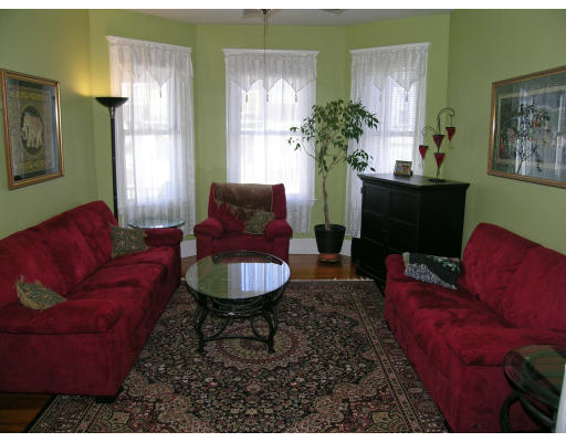 28 Parkton Road, Unit 2 Boston, MA 02130 - Photo 3 of 14 a living room with furniture rug and window