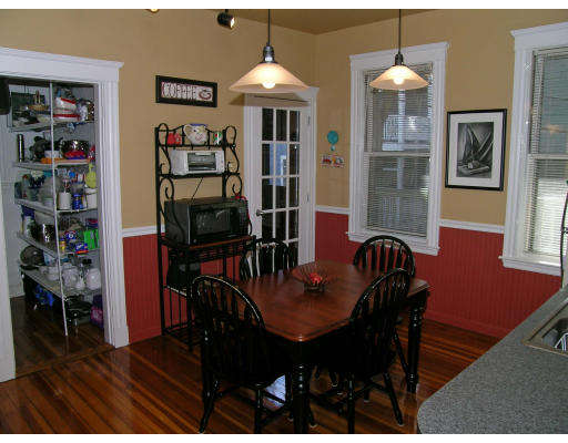 28 Parkton Road, Unit 2 Boston, MA 02130 - Photo 5 of 14 a dining room with furniture and wooden floor