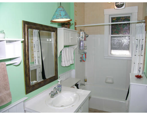 28 Parkton Road, Unit 2 Boston, MA 02130 - Photo 10 of 14 a bathroom with a sink and a mirror