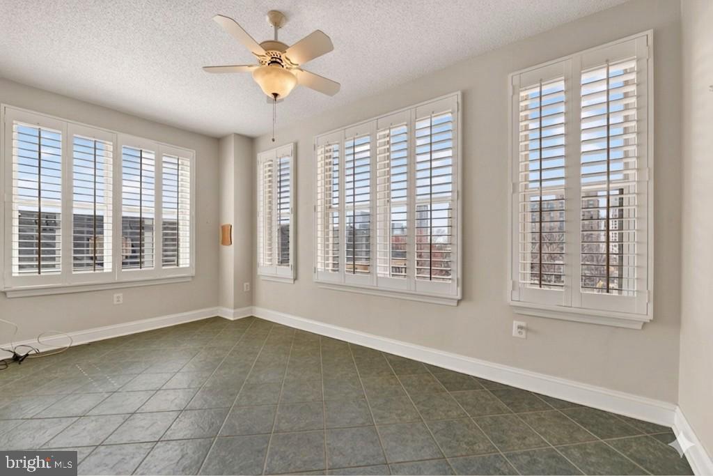 11776 Stratford House Place, Unit 502 Reston, VA 20190 - Photo 13 of 34 a view of an empty room with a window