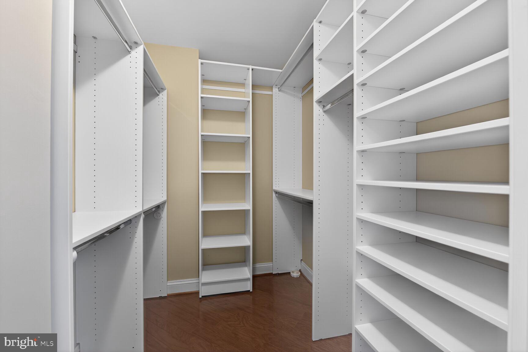 11776 Stratford House Place, Unit 502 Reston, VA 20190 - Photo 18 of 34 a view of walk in closet with empty racks