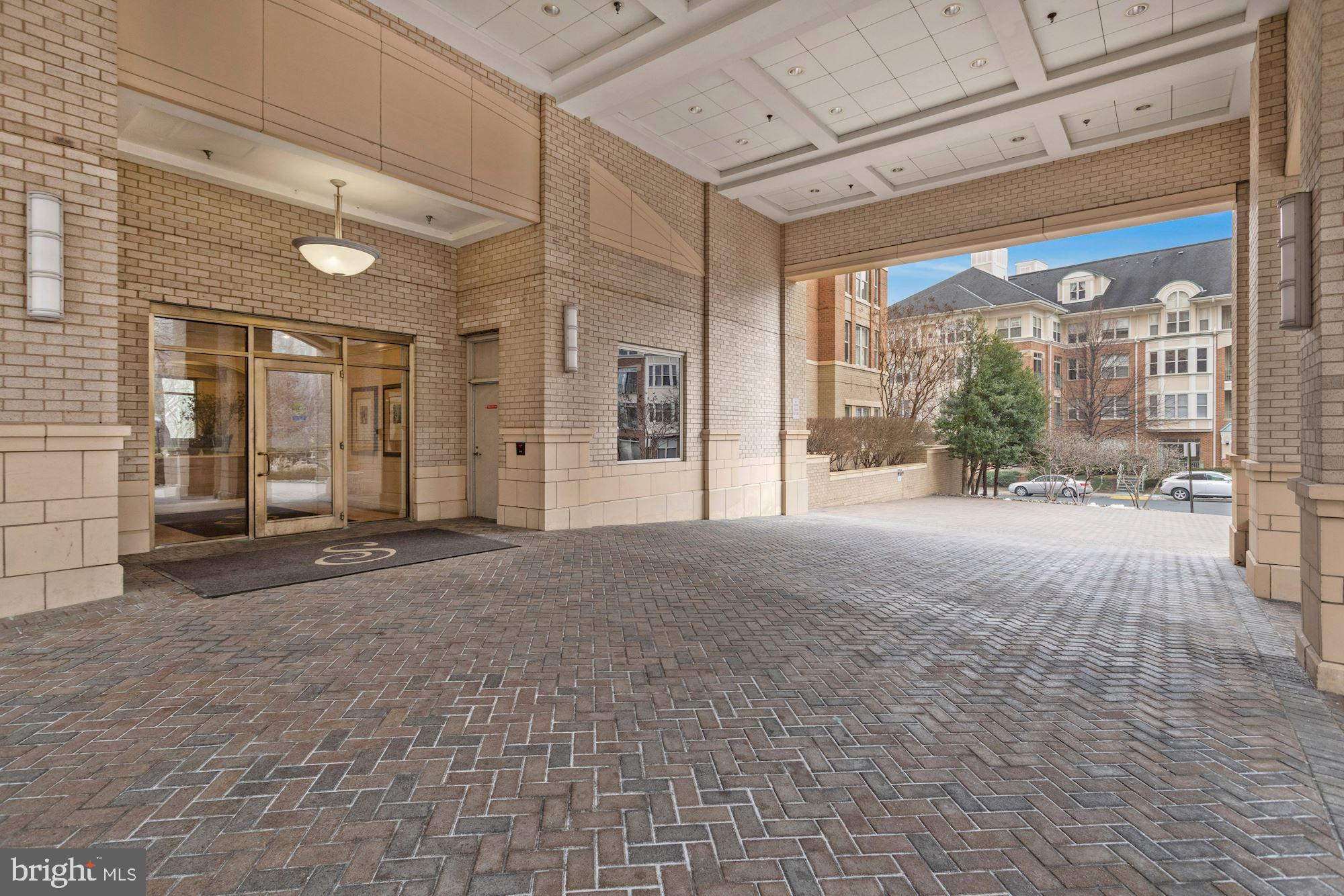11776 Stratford House Place, Unit 502 Reston, VA 20190 - Photo 25 of 35 a view of a building with large windows