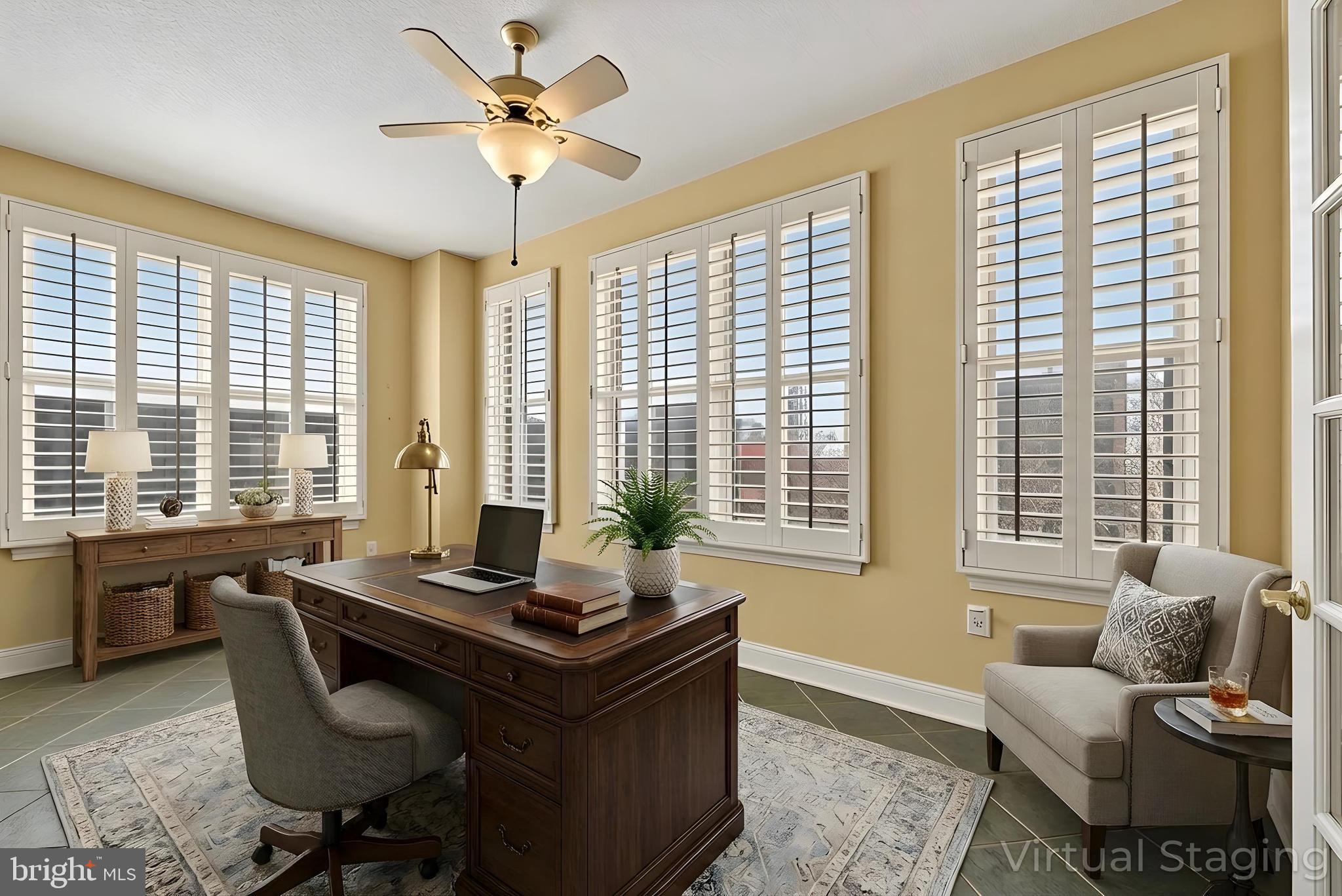 11776 Stratford House Place, Unit 502 Reston, VA 20190 - Photo 3 of 35 a living room with furniture and windows
