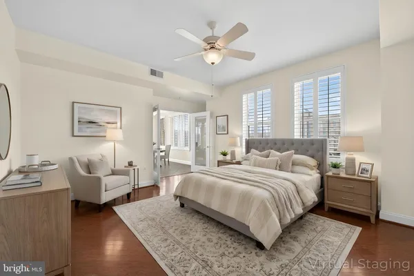 a bedroom with a bed and furniture