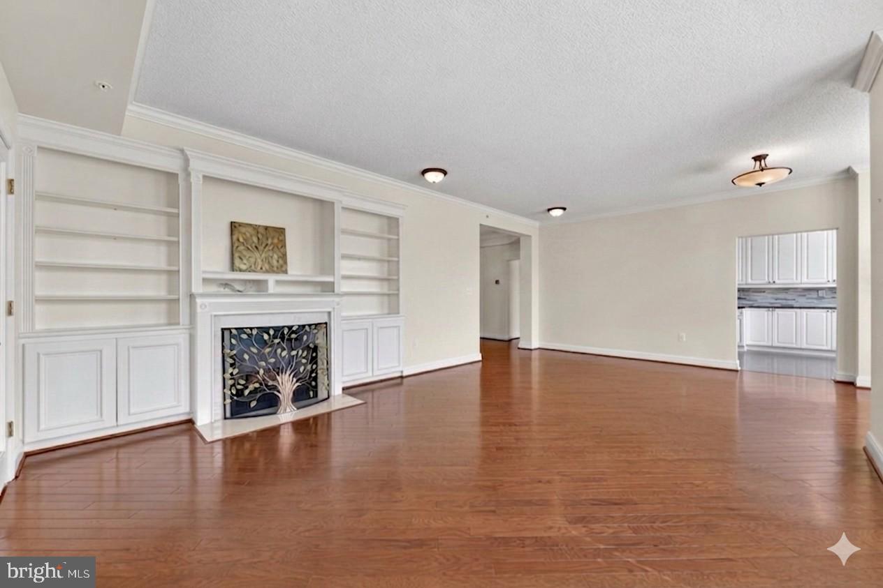 11776 Stratford House Place, Unit 502 Reston, VA 20190 - Photo 6 of 34 Dining Room & Living Room