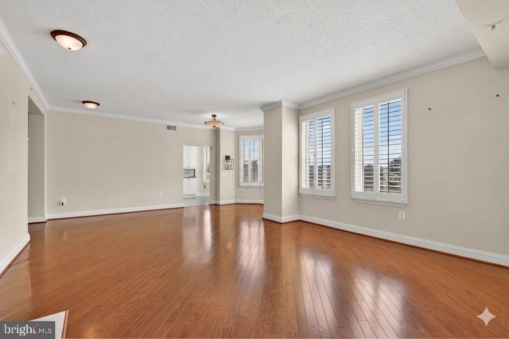 11776 Stratford House Place, Unit 502 Reston, VA 20190 - Photo 8 of 34 Dining Room & Living Room