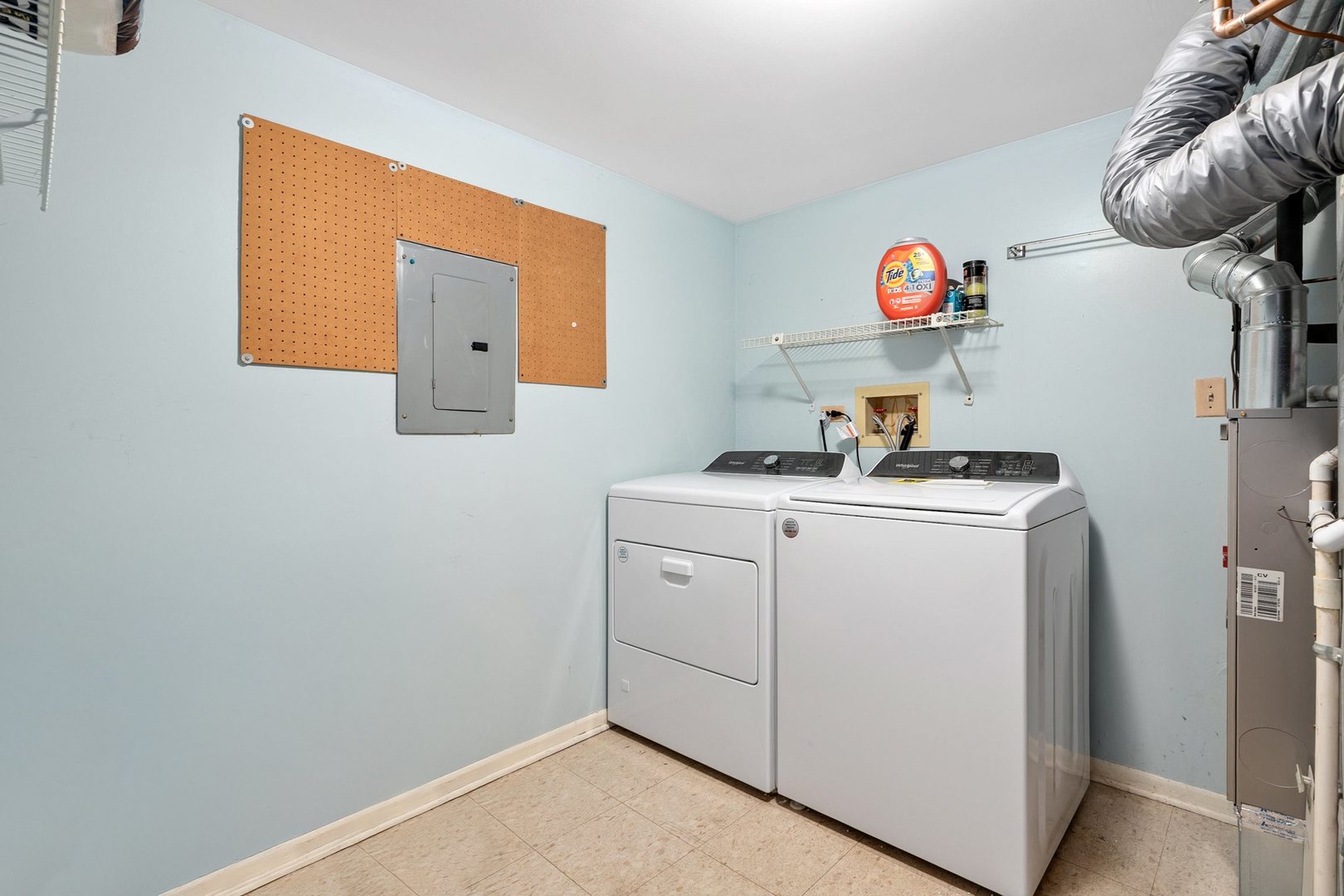 35 Buckingham Lane Buffalo Grove, IL 60089 - Photo 15 of 18 a room with storage and utility