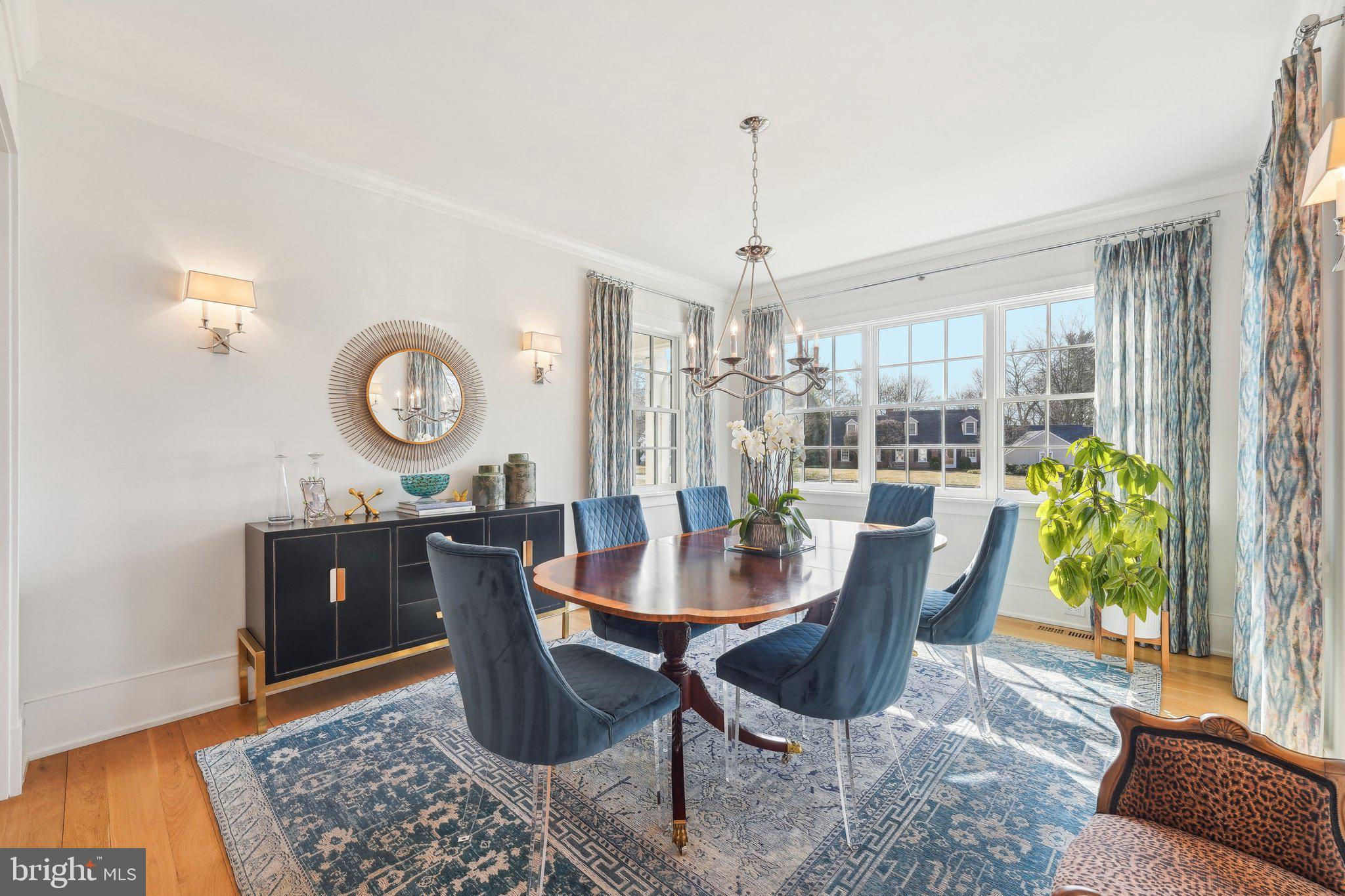 111 Steeplechase Road Devon, PA 19333 - Photo 11 of 77 a view of a dining room with furniture and chandelier