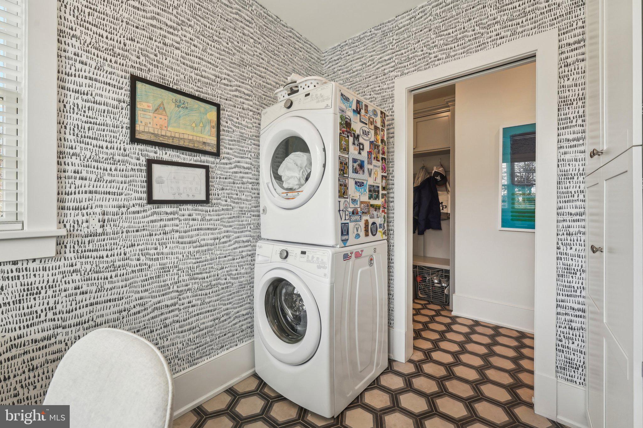 111 Steeplechase Road Devon, PA 19333 - Photo 32 of 77 a utility room with dryer and washer