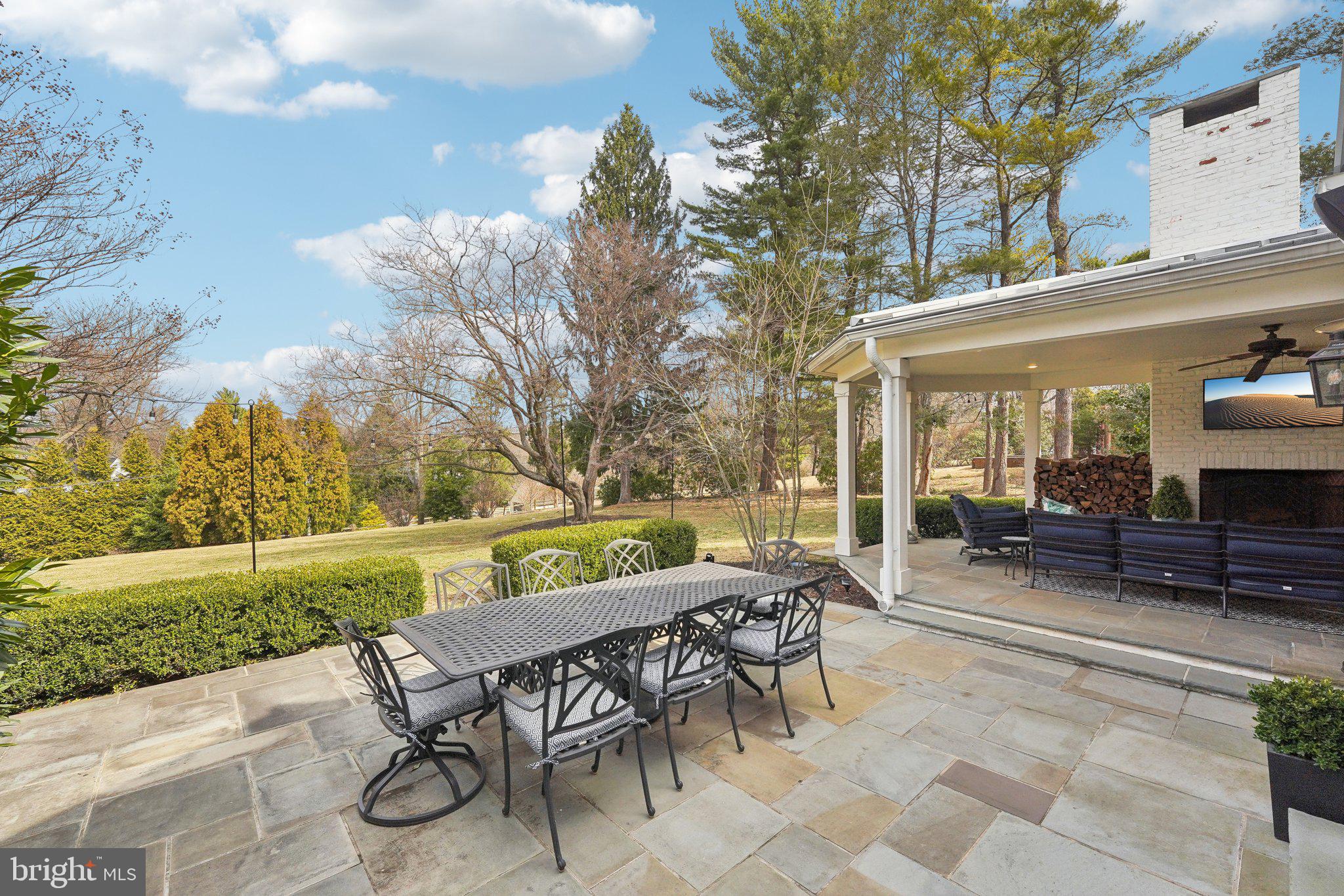 111 Steeplechase Road Devon, PA 19333 - Photo 66 of 77 a view of a patio with table and chairs and potted plants