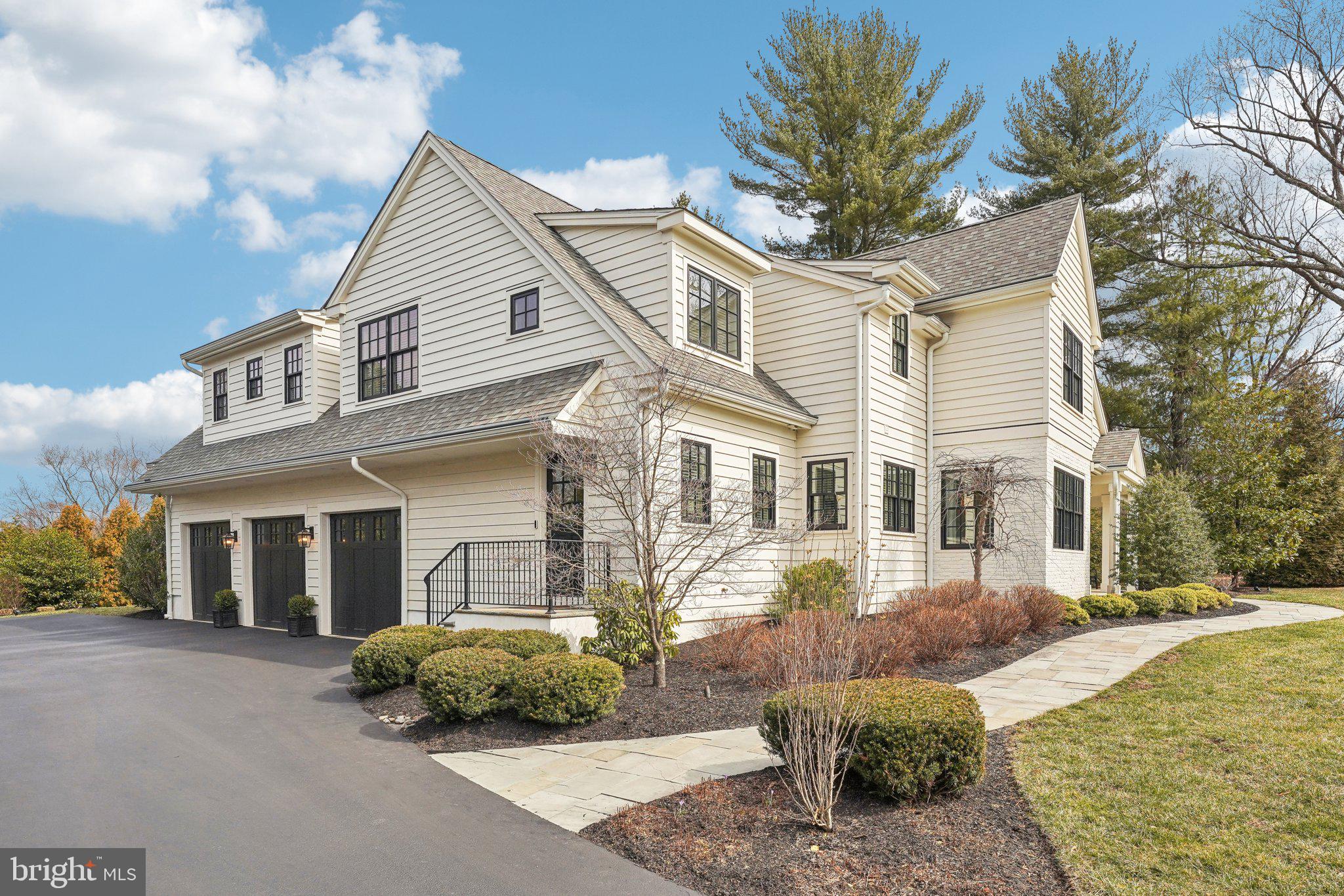 111 Steeplechase Road Devon, PA 19333 - Photo 73 of 77 a front view of a house with garden