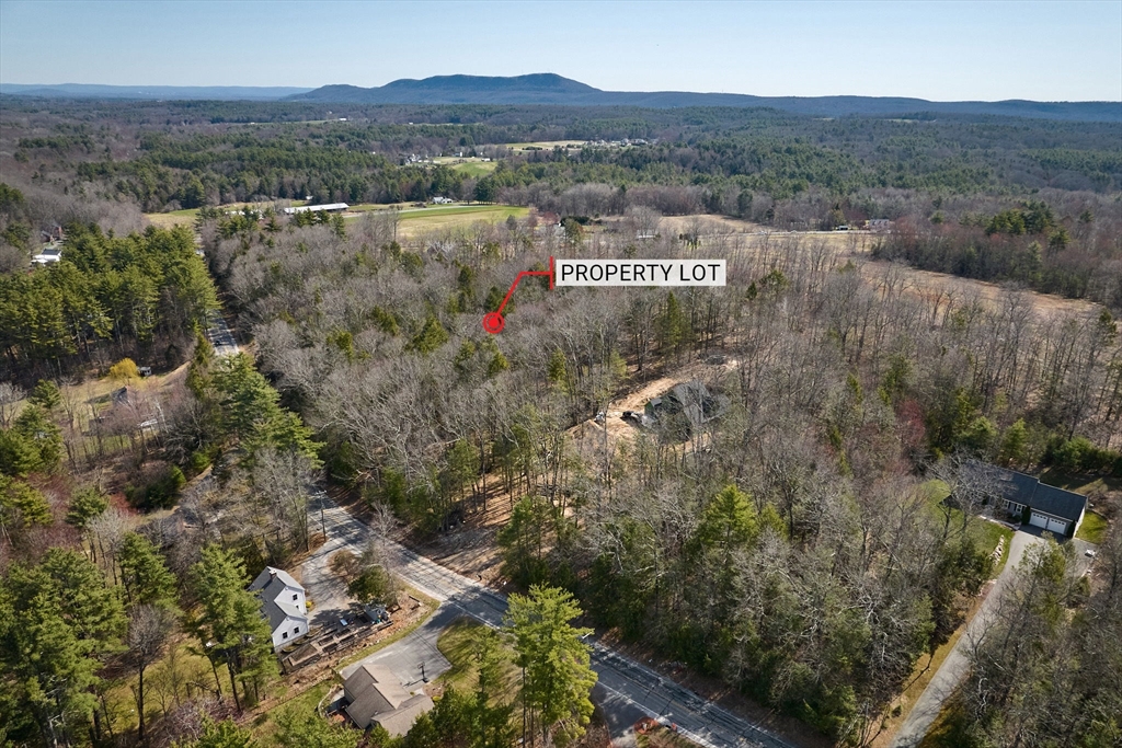 119 Brickyard Road Southampton, MA 01073 - Photo 2 of 9 an aerial view of residential house with an outdoor space and seating