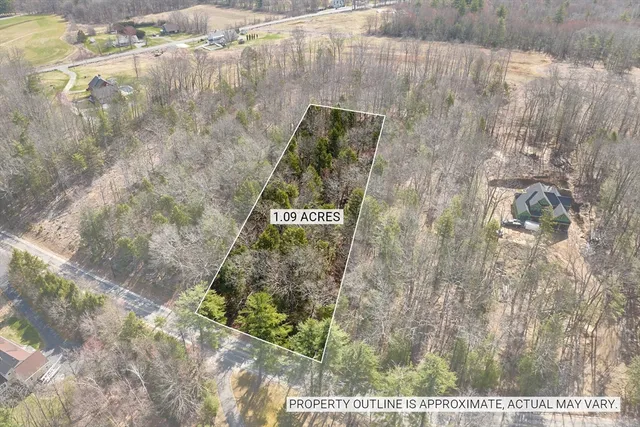 a sign that is on the side of a wooden wall