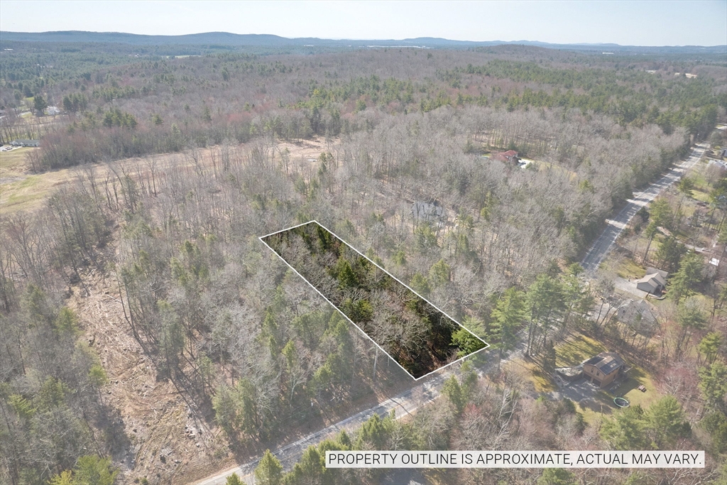 119 Brickyard Road Southampton, MA 01073 - Photo 8 of 9 a view of a yard in a field