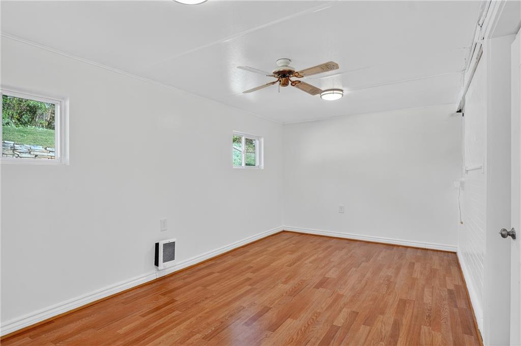 1209 Varner Road Pittsburgh, PA 15227 - Photo 15 of 40 a view of empty room with wooden floor