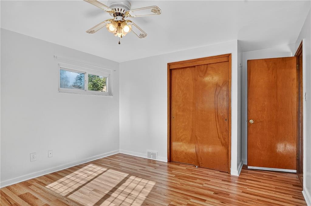 1209 Varner Road Pittsburgh, PA 15227 - Photo 20 of 40 wooden floor in an empty room with a window
