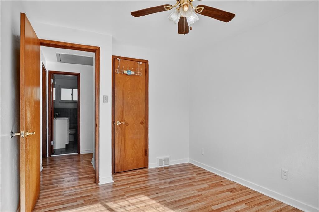 1209 Varner Road Pittsburgh, PA 15227 - Photo 22 of 40 an empty room and a gallery with wooden floor