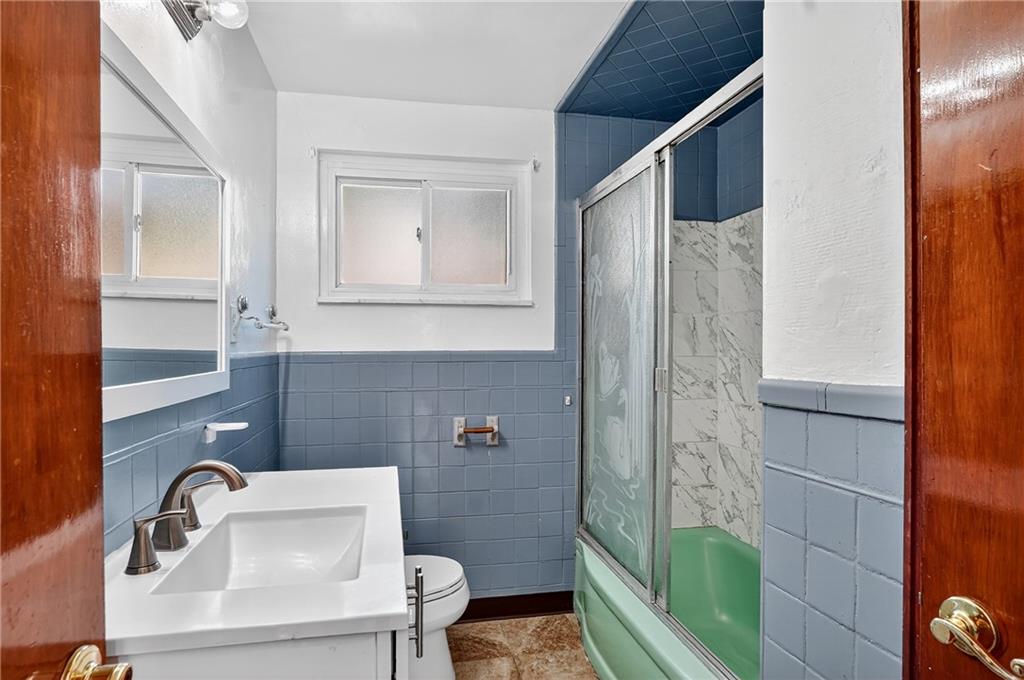 1209 Varner Road Pittsburgh, PA 15227 - Photo 23 of 40 a bathroom with a sink toilet and shower