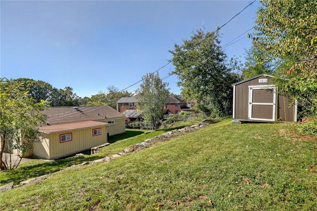1209 Varner Road Pittsburgh, PA 15227 - Photo 35 of 40 a view of a house with a yard