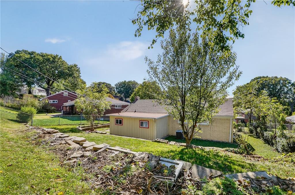 1209 Varner Road Pittsburgh, PA 15227 - Photo 36 of 40 a front view of a house with garden