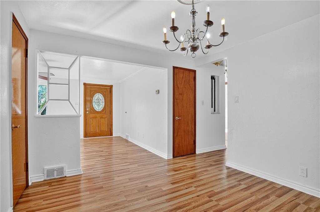 1209 Varner Road Pittsburgh, PA 15227 - Photo 10 of 40 a view of a livingroom with wooden floor