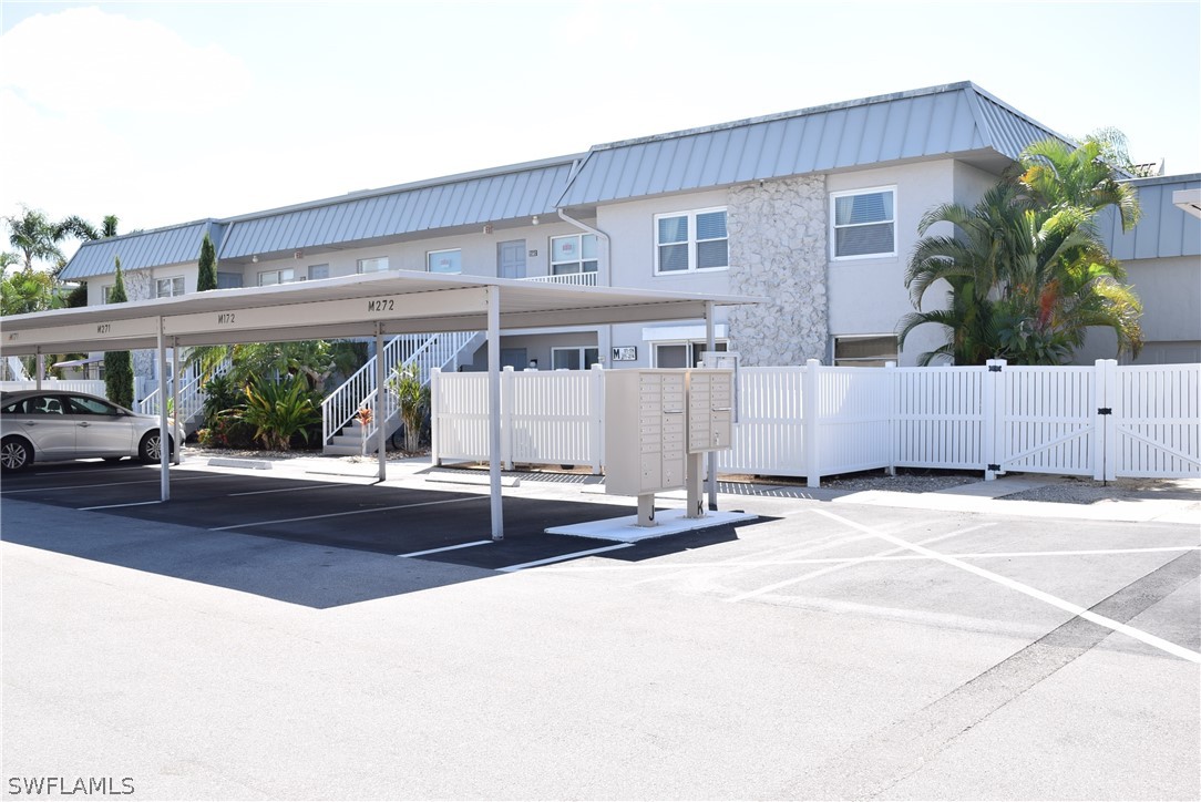 6777 Winkler Road, Unit 174 Fort Myers, FL 33919 - Photo 1 of 19 a house view with a outdoor space