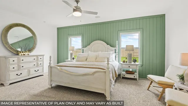 a bed room with a bed and a chair