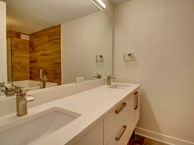 a bathroom with a sink and a bathtub