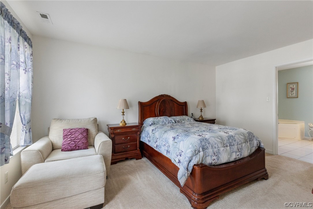 6708 Gills Gate Court Chesterfield, VA 23832 - Photo 19 of 34 a bedroom with a bed and a couch