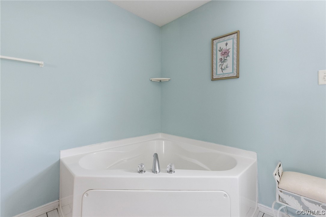 6708 Gills Gate Court Chesterfield, VA 23832 - Photo 21 of 34 a white bath tub sitting in a bathroom