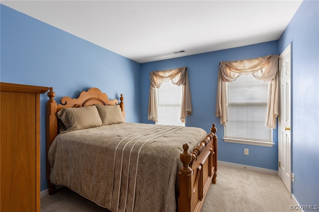 6708 Gills Gate Court Chesterfield, VA 23832 - Photo 23 of 34 a bedroom with a bed and a window