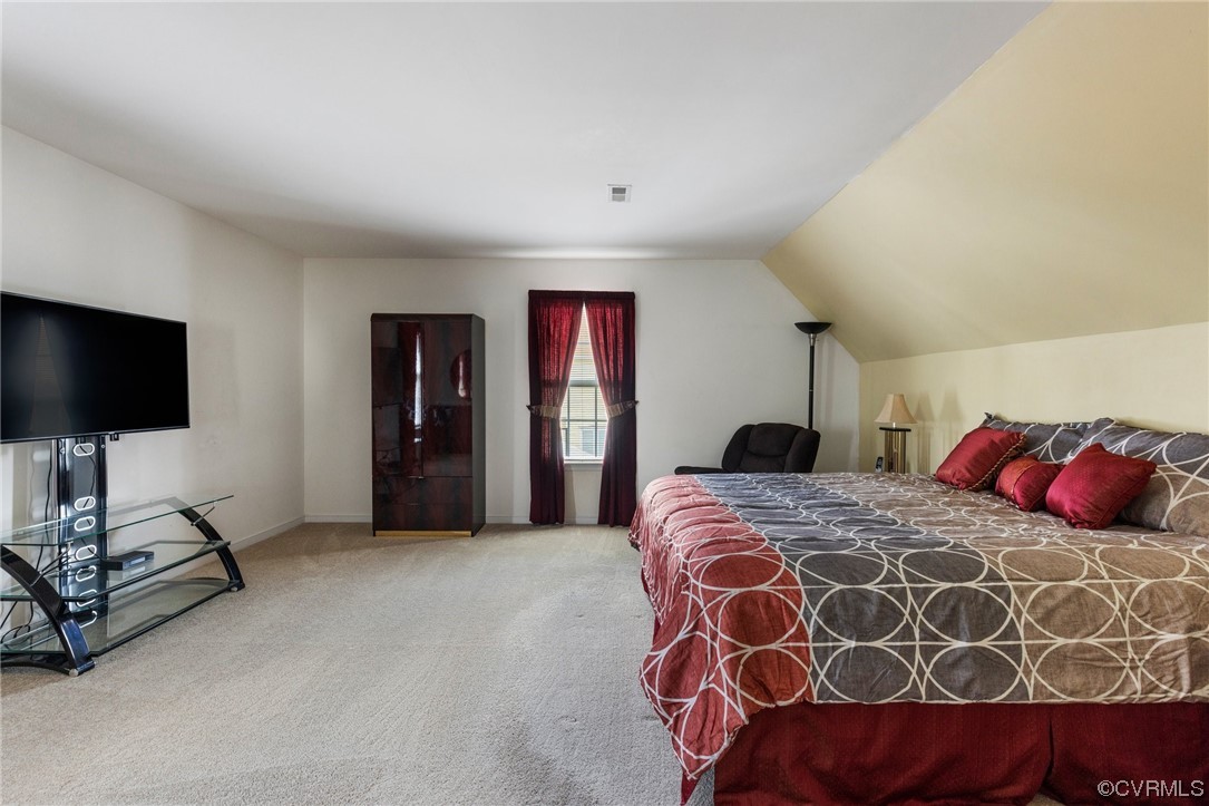 6708 Gills Gate Court Chesterfield, VA 23832 - Photo 25 of 34 a bedroom with a bed and a flat screen tv