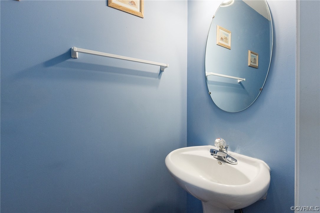 6708 Gills Gate Court Chesterfield, VA 23832 - Photo 28 of 34 a bathroom with a sink and a mirror