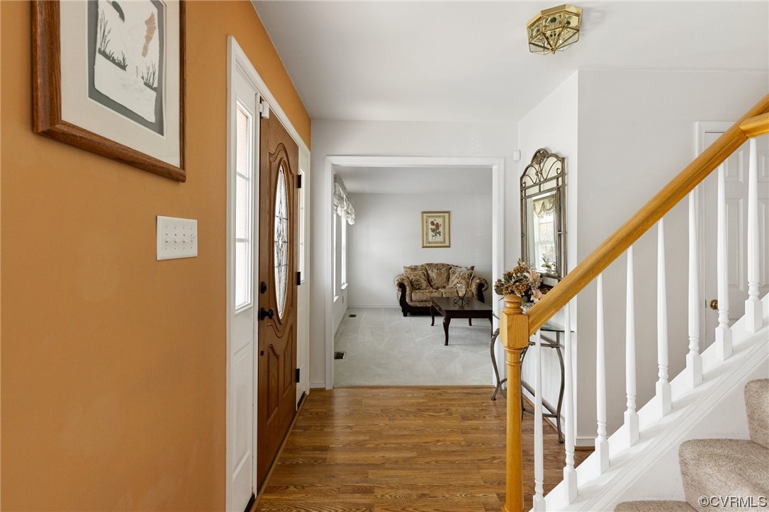 6708 Gills Gate Court Chesterfield, VA 23832 - Photo 4 of 34 a view of a hallway with wooden floor and staircase