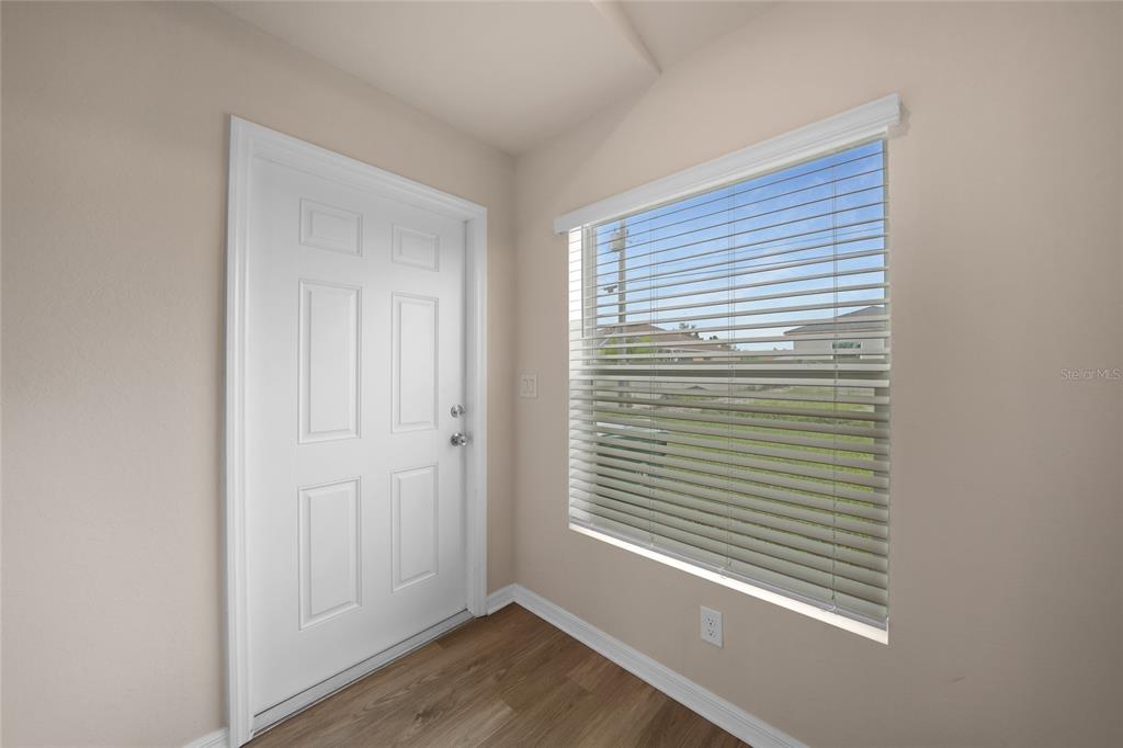 11057 Pendleton Avenue Englewood, FL 34224 - Photo 19 of 37 a view of a room that has a window in it