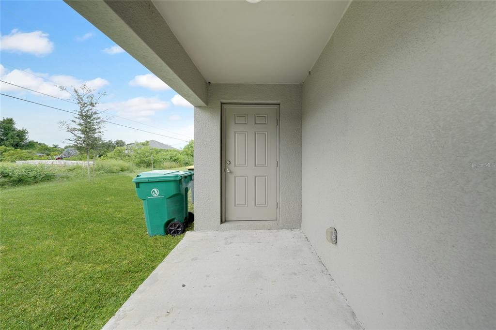 11057 Pendleton Avenue Englewood, FL 34224 - Photo 21 of 37 a view of a garden from a windows