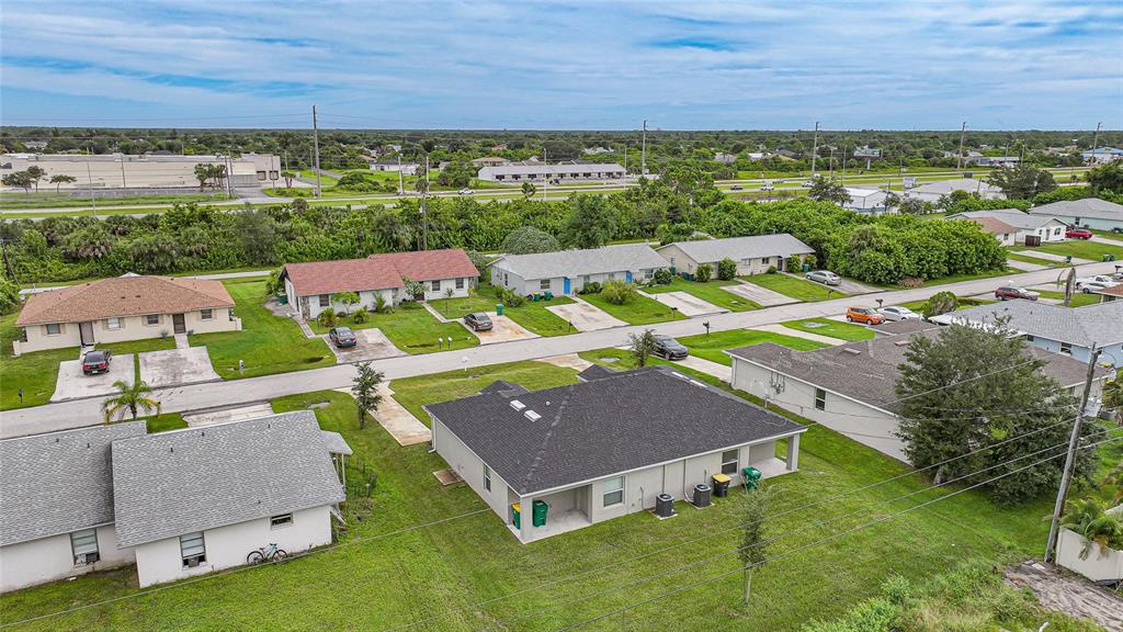 11057 Pendleton Avenue Englewood, FL 34224 - Photo 33 of 37 an aerial view of a house with garden space and outdoor space