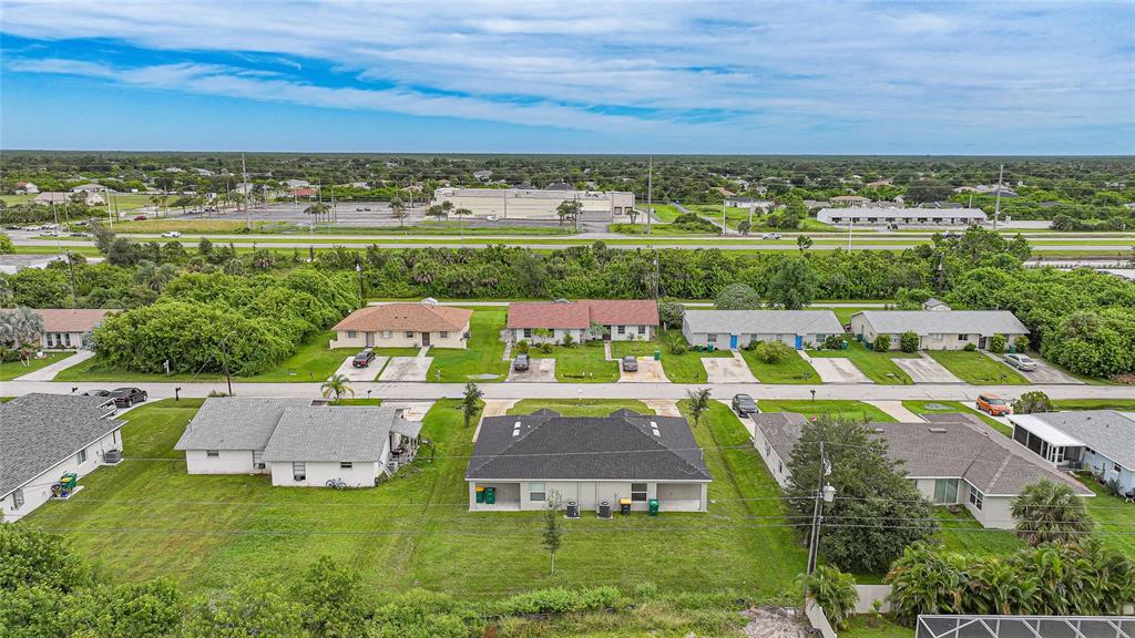 11057 Pendleton Avenue Englewood, FL 34224 - Photo 34 of 37 an aerial view of a house with a garden