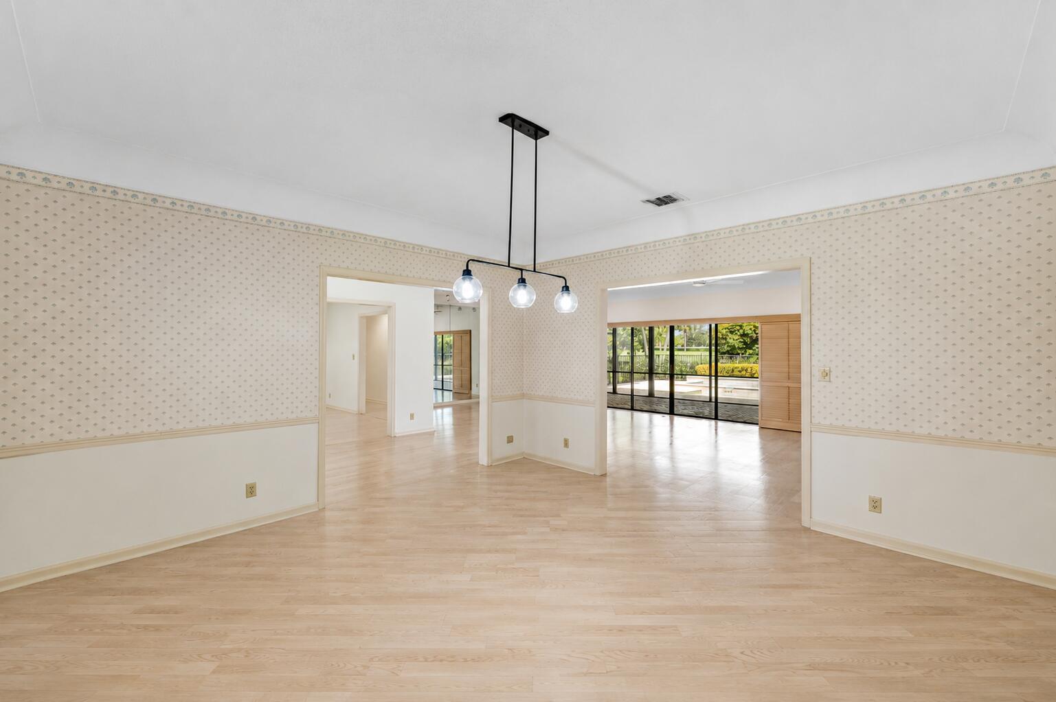 1851 Thatch Palm Drive Boca Raton, FL 33432 - Photo 23 of 70 a view of an empty room with window