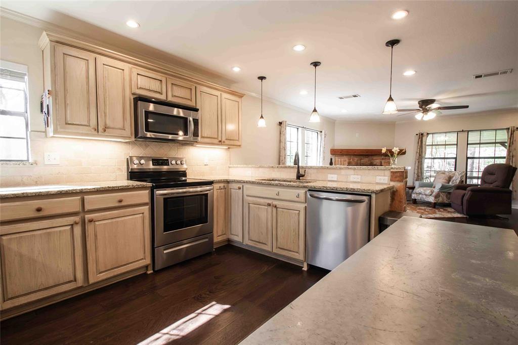 1024 Summit Ridge Murchison, TX 75778 - Photo 16 of 35 another view of kitchen with granite counter tops