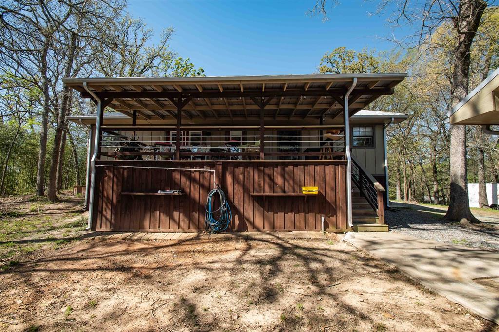 1024 Summit Ridge Murchison, TX 75778 - Photo 4 of 35 View of back of house with large covered porch 24x12