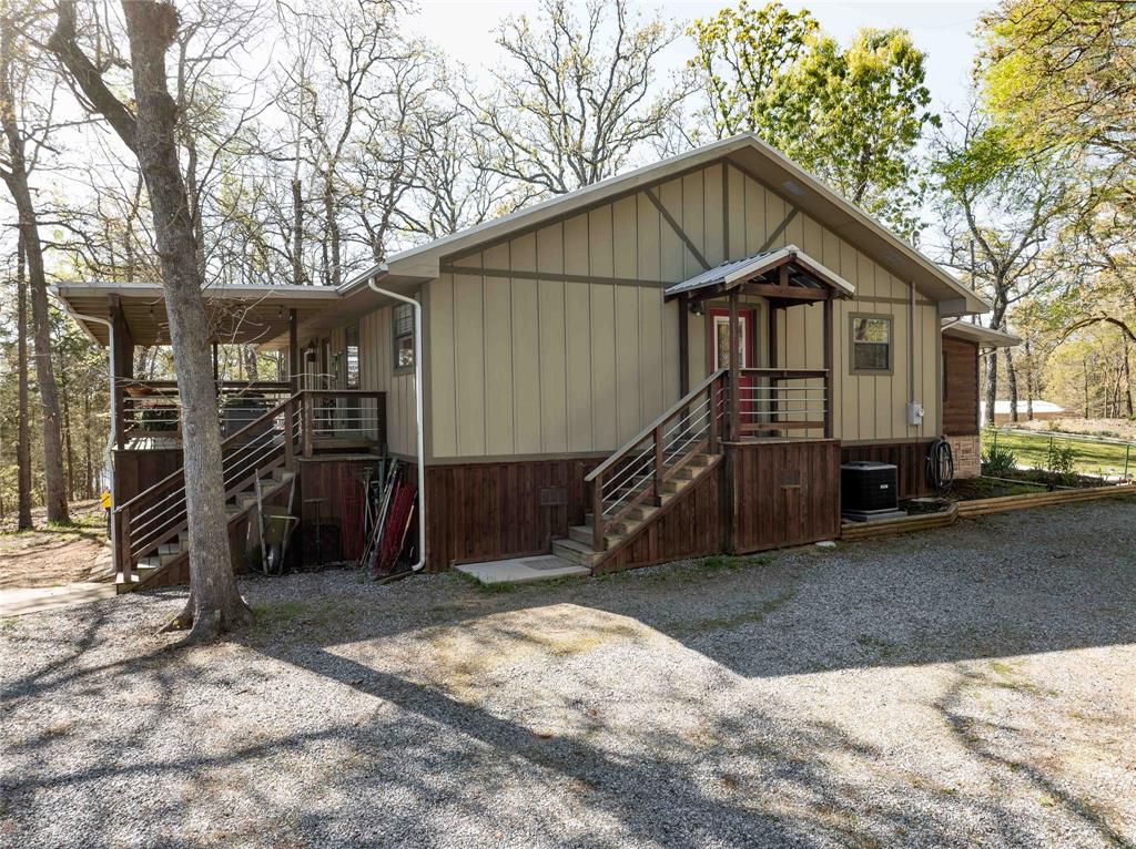 1024 Summit Ridge Murchison, TX 75778 - Photo 8 of 35 View of side entrance to home and the back porch