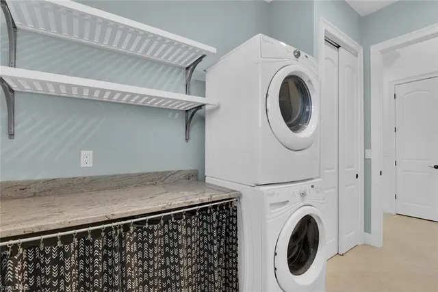 a close view of a washer and dryer in a utility room